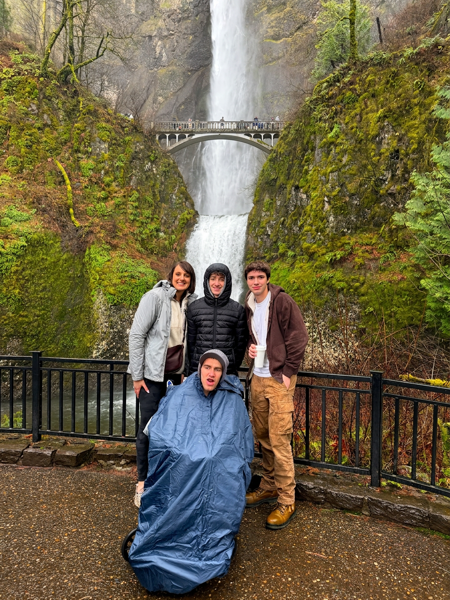 img_6803 Carter and three family members pose in front of a waterfall during a trip to Oregon.